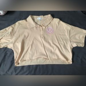 size small, tan color, crop top. barely used w/ no stains.